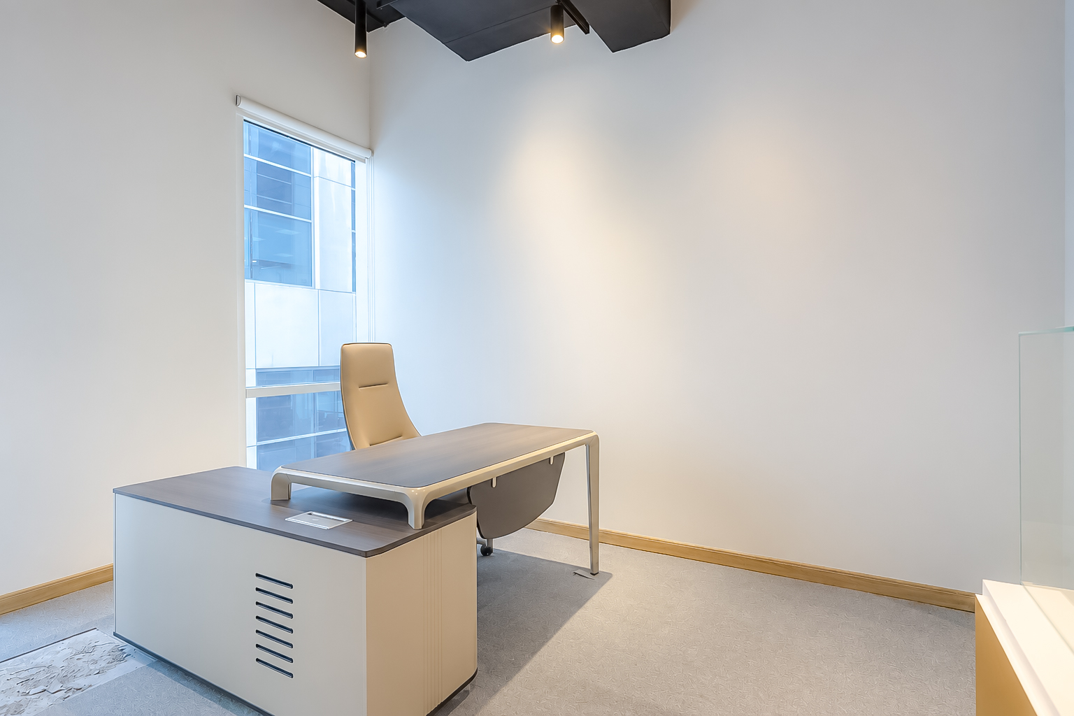 Private office with executive desk and leather chair