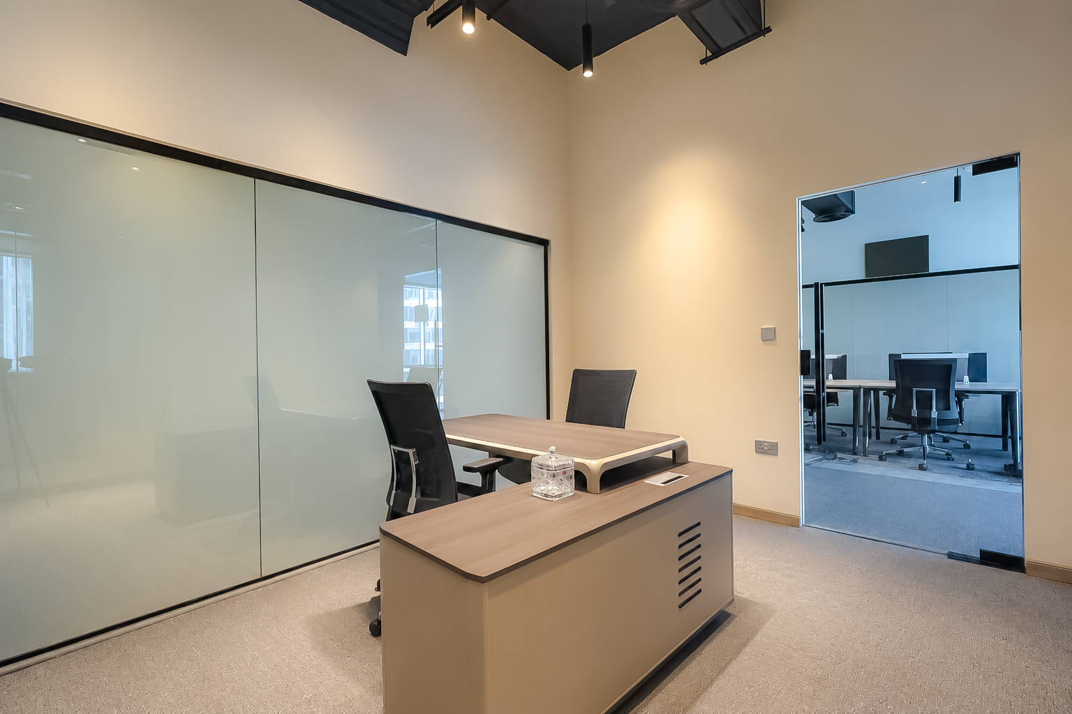 Connected office suite looking into the work floor